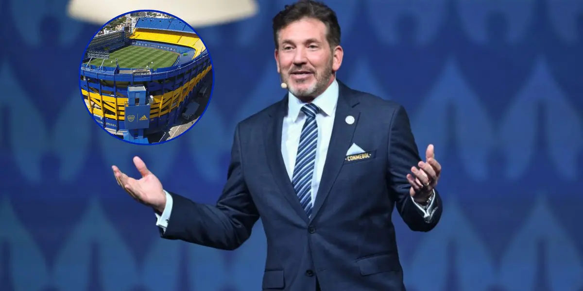 Alejandro Domínguez de traje junto a la Bombonera.