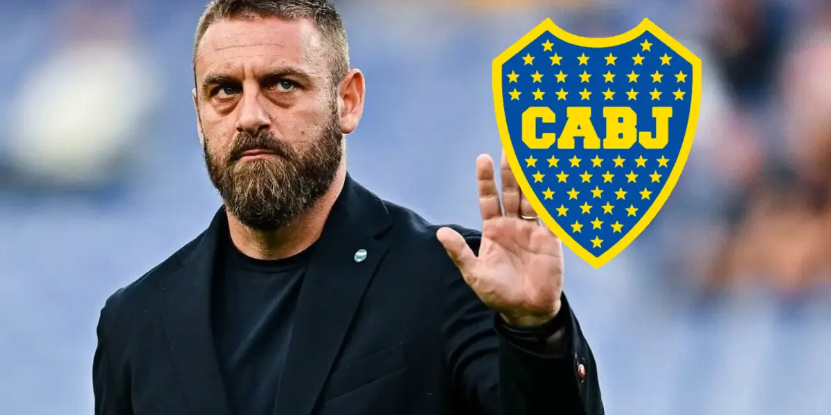 Daniele De Rossi de traje junto al escudo de Boca.